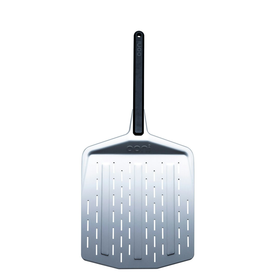 73000_Ooni_12in_Perforated_Peel_Silver_01_PDP_WEB